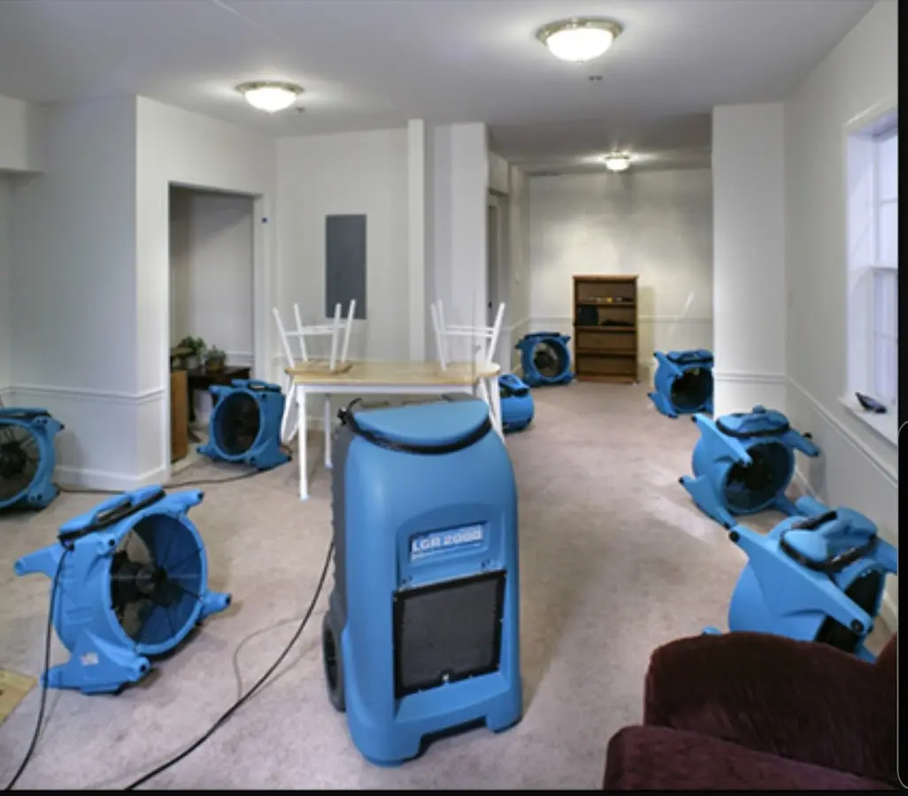 Air movers and dehumidifier setup for Water Damage Restoration in Guilford